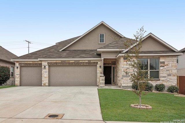 view of front of house featuring a garage and a front lawn