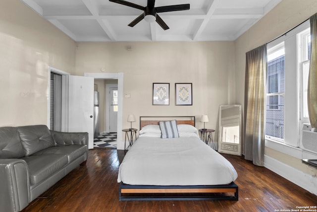 bedroom with dark wood-type flooring, coffered ceiling, and beam ceiling