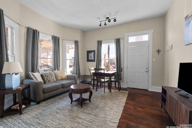 living room with dark hardwood / wood-style floors