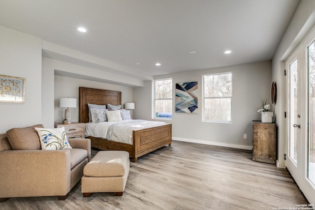 bedroom featuring light wood-type flooring