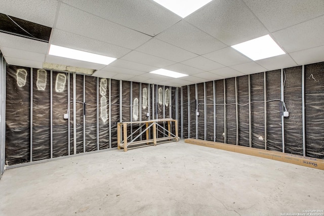 basement featuring a drop ceiling