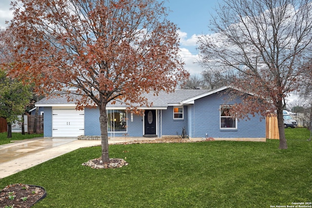 single story home featuring a garage and a front yard