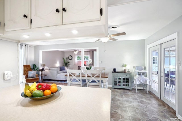 dining area featuring french doors and ceiling fan