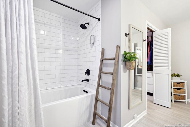 bathroom with shower / bathtub combination with curtain