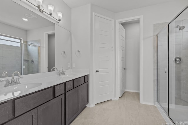 2439 Tinkerton, San Antonio, TX 78245 - full bath featuring a shower stall, double vanity, and tile patterned flooring