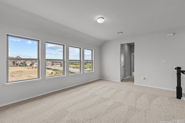 2439 Tinkerton, San Antonio, TX 78245 - spare room with light colored carpet, baseboards, and lofted ceiling
