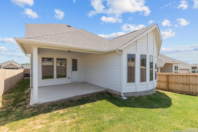 2439 Tinkerton, San Antonio, TX 78245 - back of house featuring a patio and a shingled roof