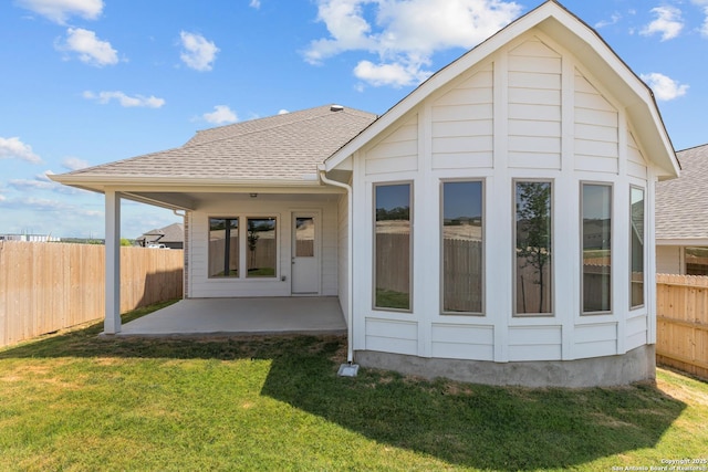 2439 Tinkerton, San Antonio, TX 78245 - back of property with roof with shingles and a patio