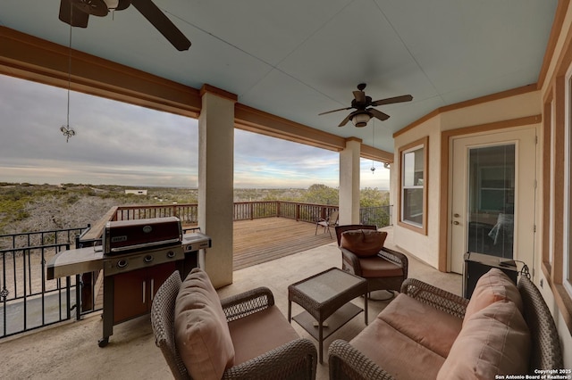 view of patio with ceiling fan, outdoor lounge area, and a deck