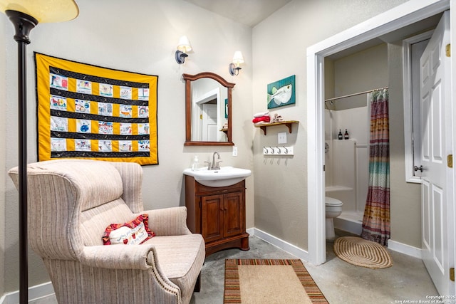 bathroom featuring toilet, vanity, concrete flooring, and curtained shower