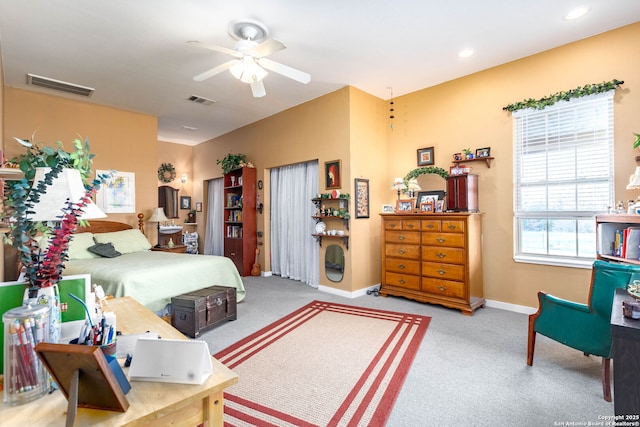 carpeted bedroom with ceiling fan