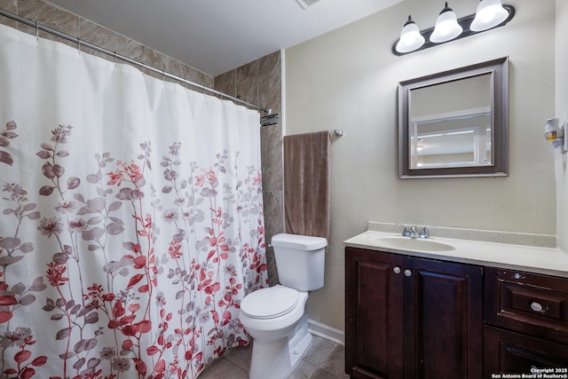 bathroom with a shower with shower curtain, vanity, toilet, and tile patterned flooring