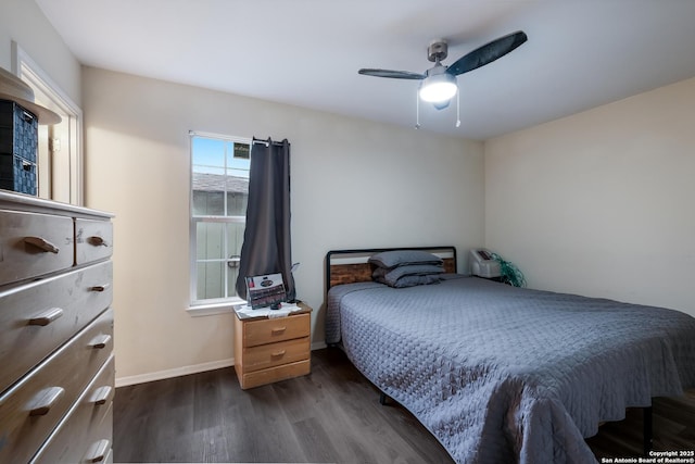 bedroom featuring ceiling fan and dark hardwood / wood-style flooring