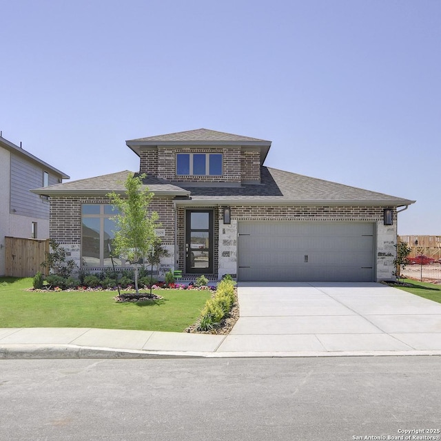 2929 Vistablue Ln, San Antonio, TX 78245 - view of front of property with a front lawn, a shingled roof, brick siding, concrete driveway, and an attached garage