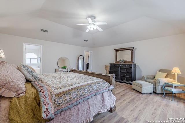 bedroom with lofted ceiling, light hardwood / wood-style flooring, and ceiling fan