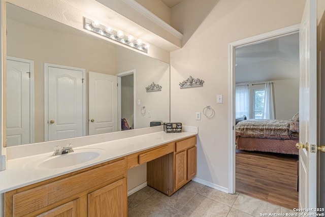 bathroom with vanity and tile patterned floors