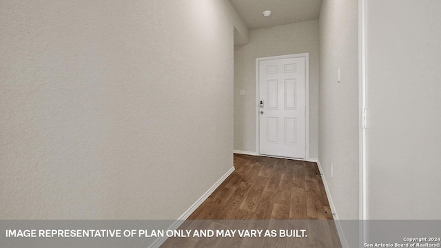 hallway featuring dark hardwood / wood-style floors