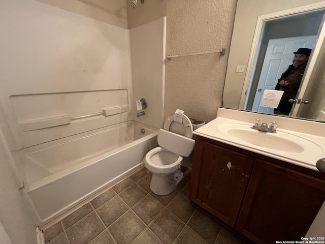 full bathroom featuring vanity, tub / shower combination, tile patterned floors, and toilet