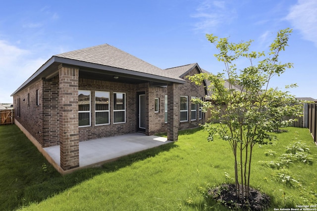 312 Hulda Trl, New Braunfels, TX 78130 - rear view of property with brick siding, a patio area, and roof with shingles
