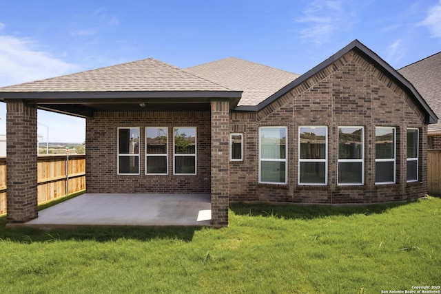 312 Hulda Trl, New Braunfels, TX 78130 - rear view of property featuring brick siding, a patio area, and roof with shingles