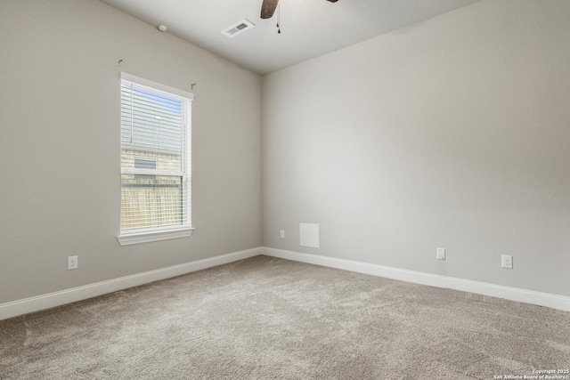 carpeted empty room with ceiling fan