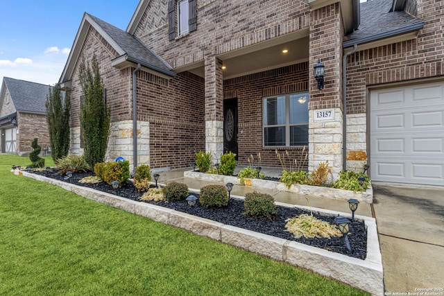 entrance to property with a yard