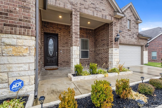 property entrance with a garage