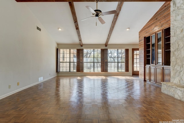 unfurnished living room featuring dark parquet flooring, plenty of natural light, high vaulted ceiling, and beam ceiling