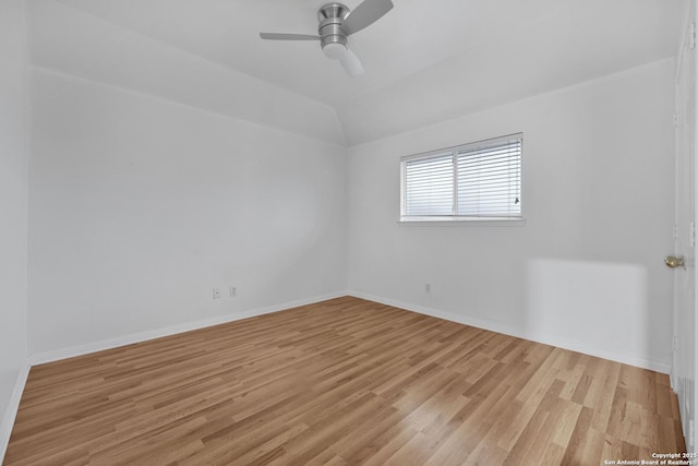 unfurnished room with light hardwood / wood-style flooring, ceiling fan, and vaulted ceiling