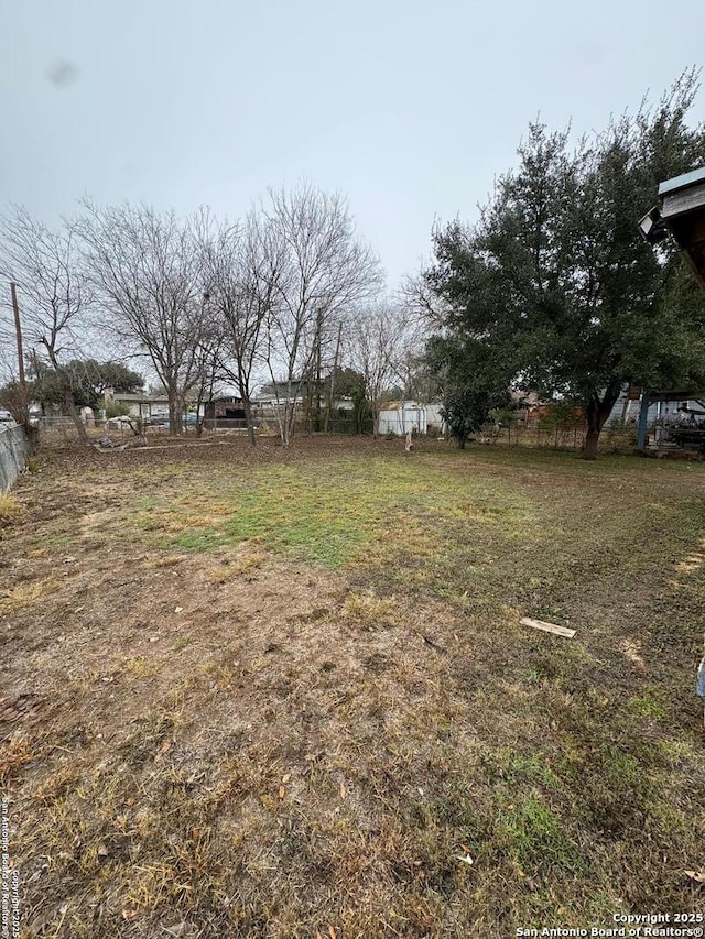 view of yard with a rural view