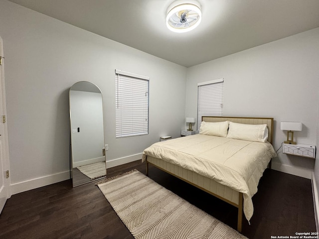 bedroom featuring dark hardwood / wood-style floors