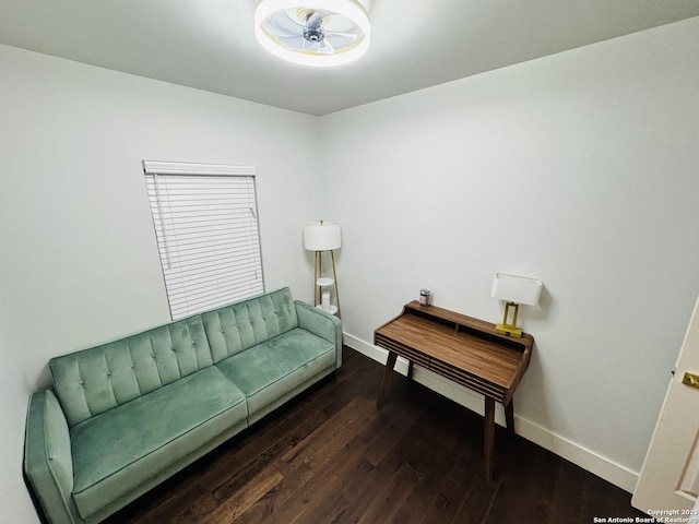 living room with dark hardwood / wood-style floors