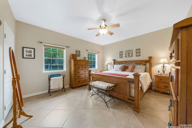 tiled bedroom with ceiling fan