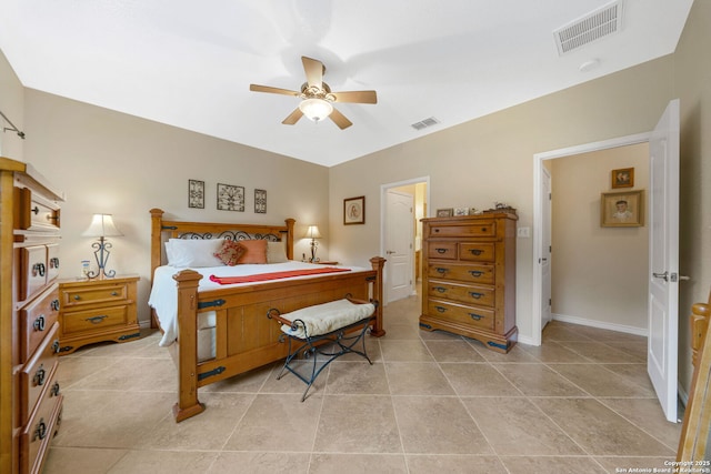 tiled bedroom with ceiling fan