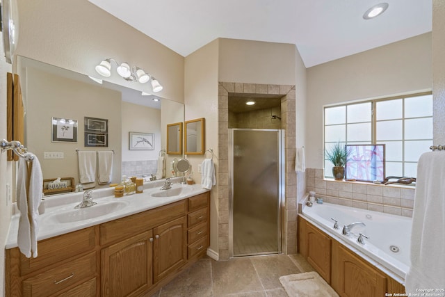 bathroom with independent shower and bath and vanity