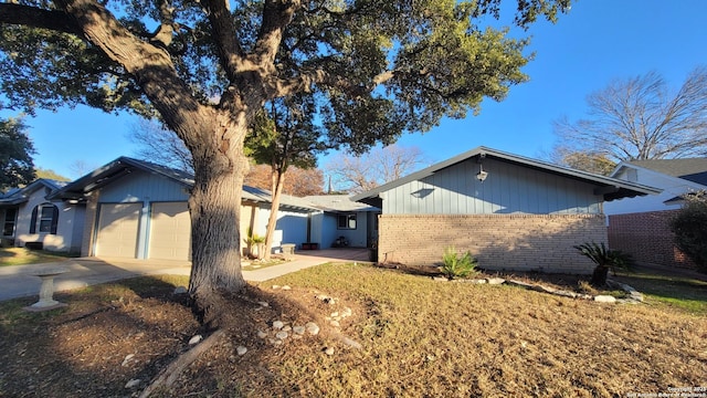 view of side of home with a garage