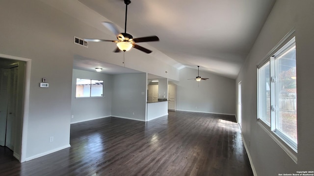 unfurnished living room with lofted ceiling, dark hardwood / wood-style floors, and ceiling fan