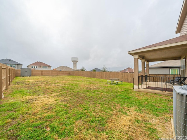 view of yard featuring central AC unit