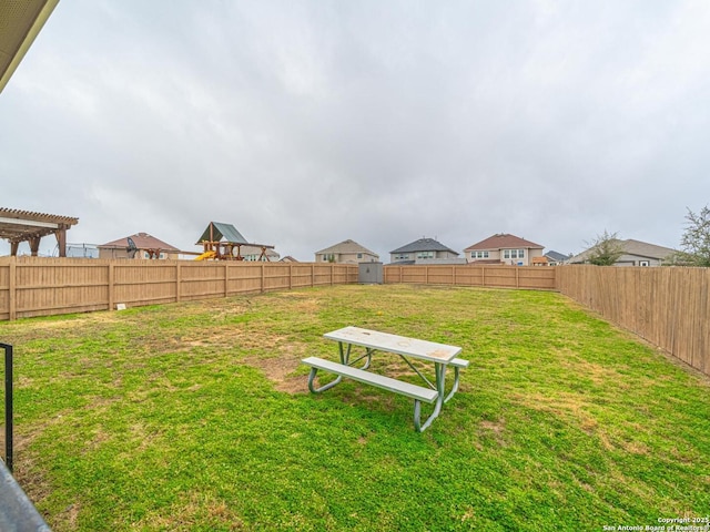 view of yard with a pergola