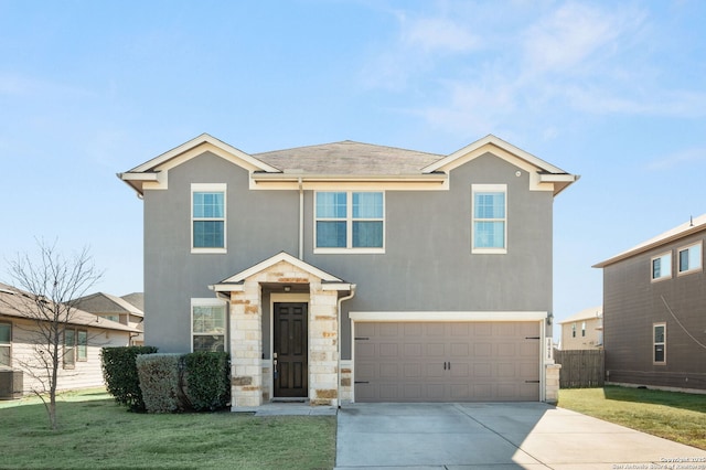 front facade featuring a garage, central AC unit, and a front lawn