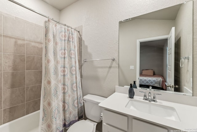 full bathroom featuring vanity, toilet, and shower / bath combo with shower curtain