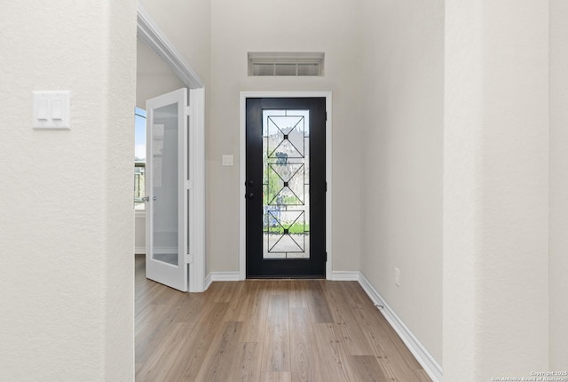 foyer featuring light wood-type flooring