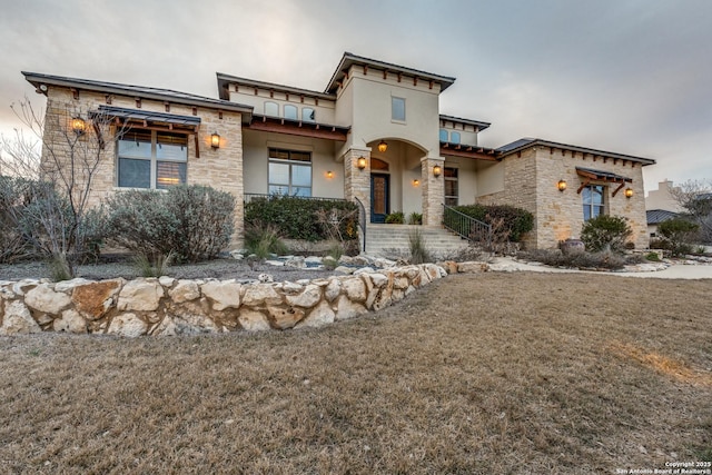 view of front of property with a front lawn