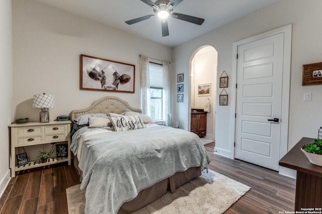 bedroom featuring dark hardwood / wood-style floors and ceiling fan