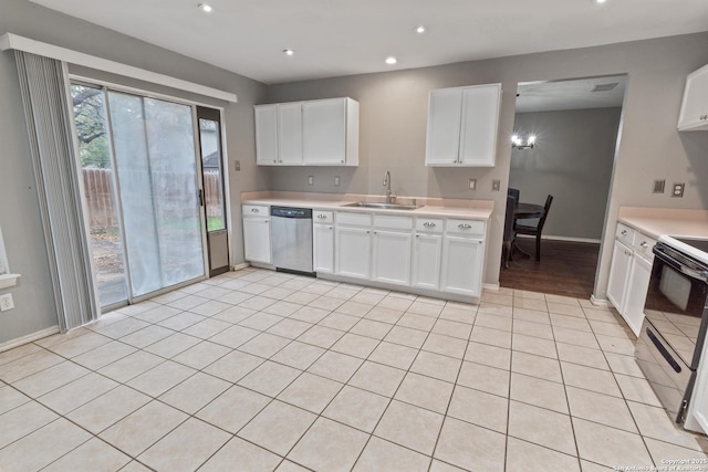 kitchen featuring dishwasher, sink, white cabinets, and electric stove