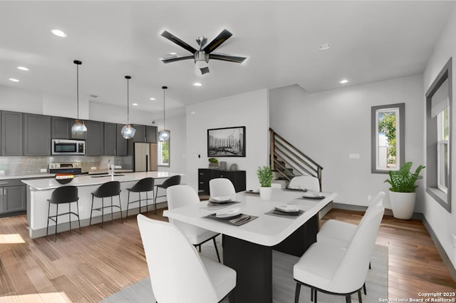 dining area with light wood-type flooring