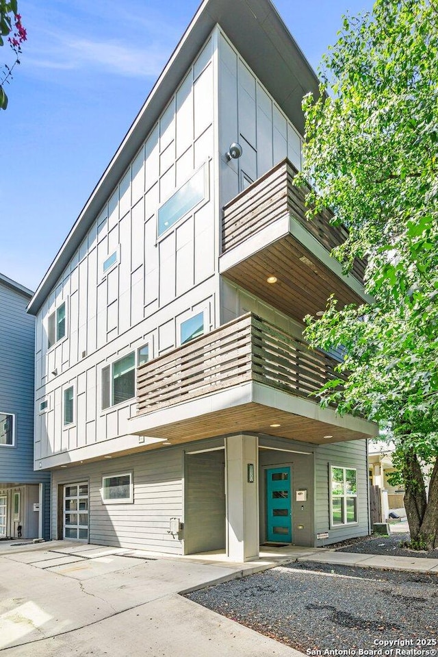 view of building exterior featuring a garage