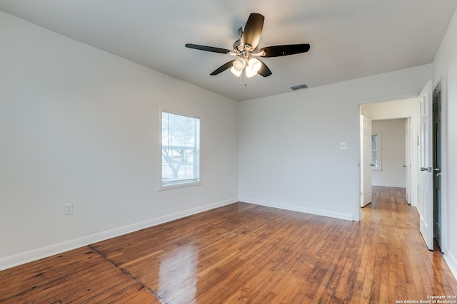 unfurnished room featuring ceiling fan and light hardwood / wood-style floors