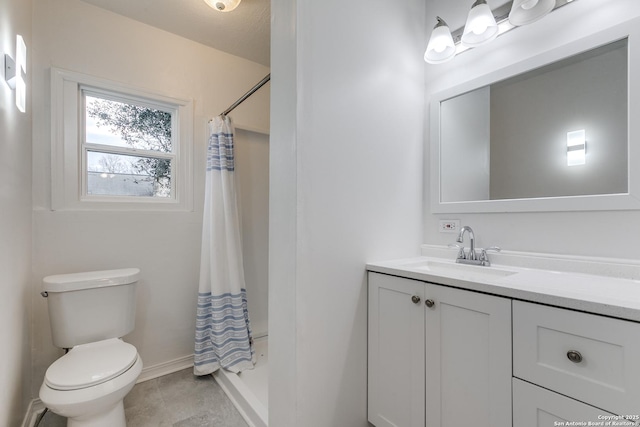 bathroom with vanity, a shower with curtain, tile patterned floors, and toilet