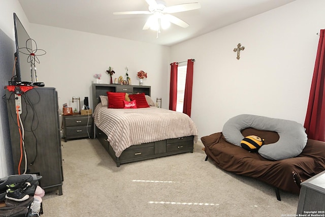 bedroom with light carpet and ceiling fan